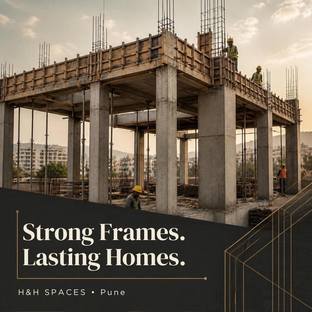 RCC column-beam frame under construction with concrete columns, beam shuttering, rebar and helmeted workers — H&H SPACES Pune