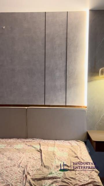 Bedroom headboard and side-table interior detail at the Viman Nagar project