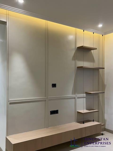Media wall and shelving detail at the Viman Nagar residential interior project